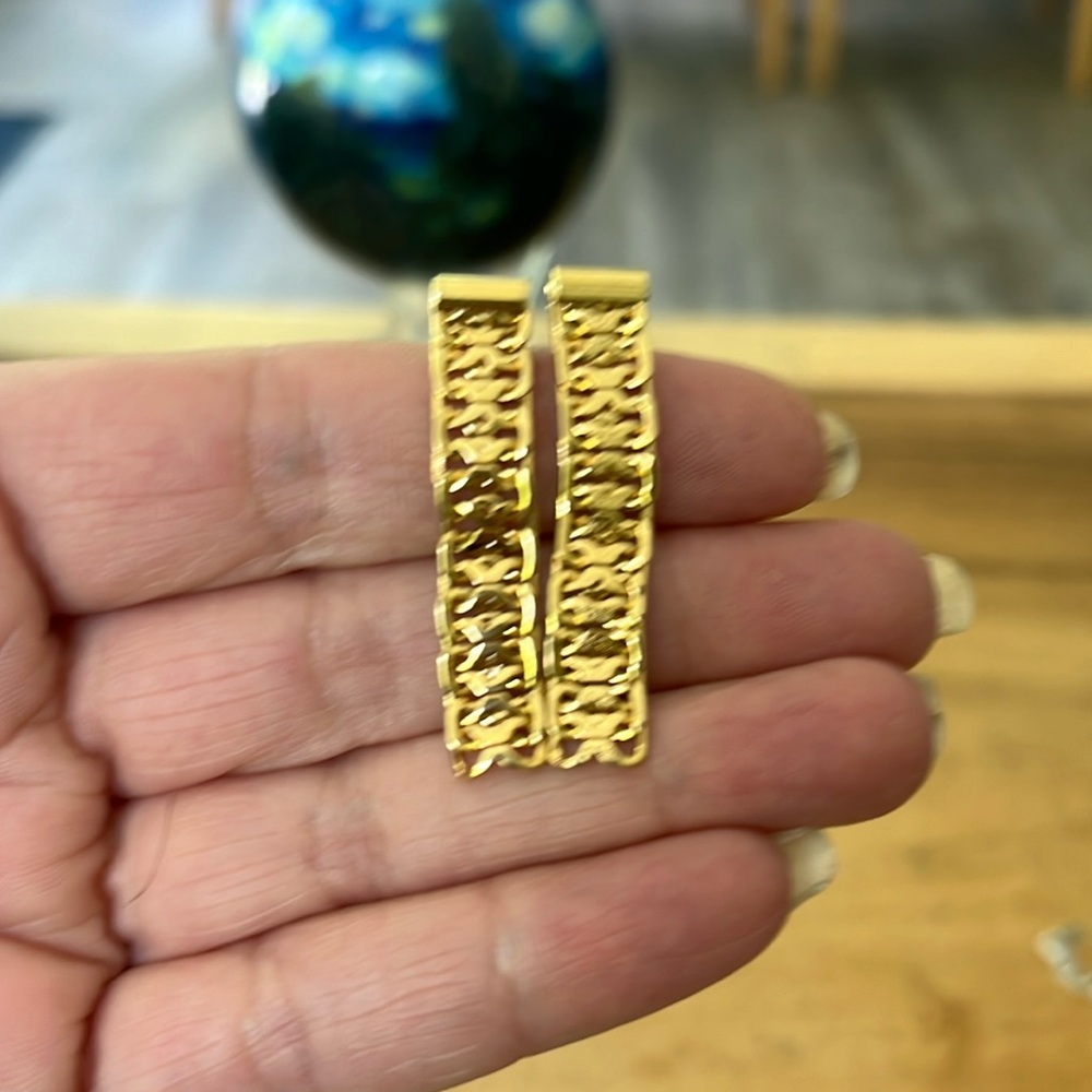 Vintage Monet Gold Tone Dangle Earrings. X design. Very good condition.